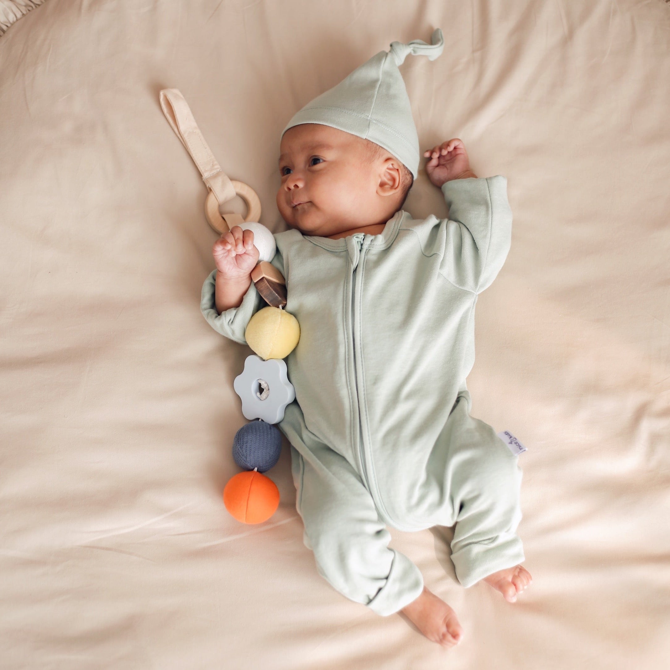 Baby playing with our Many Balls Mobile